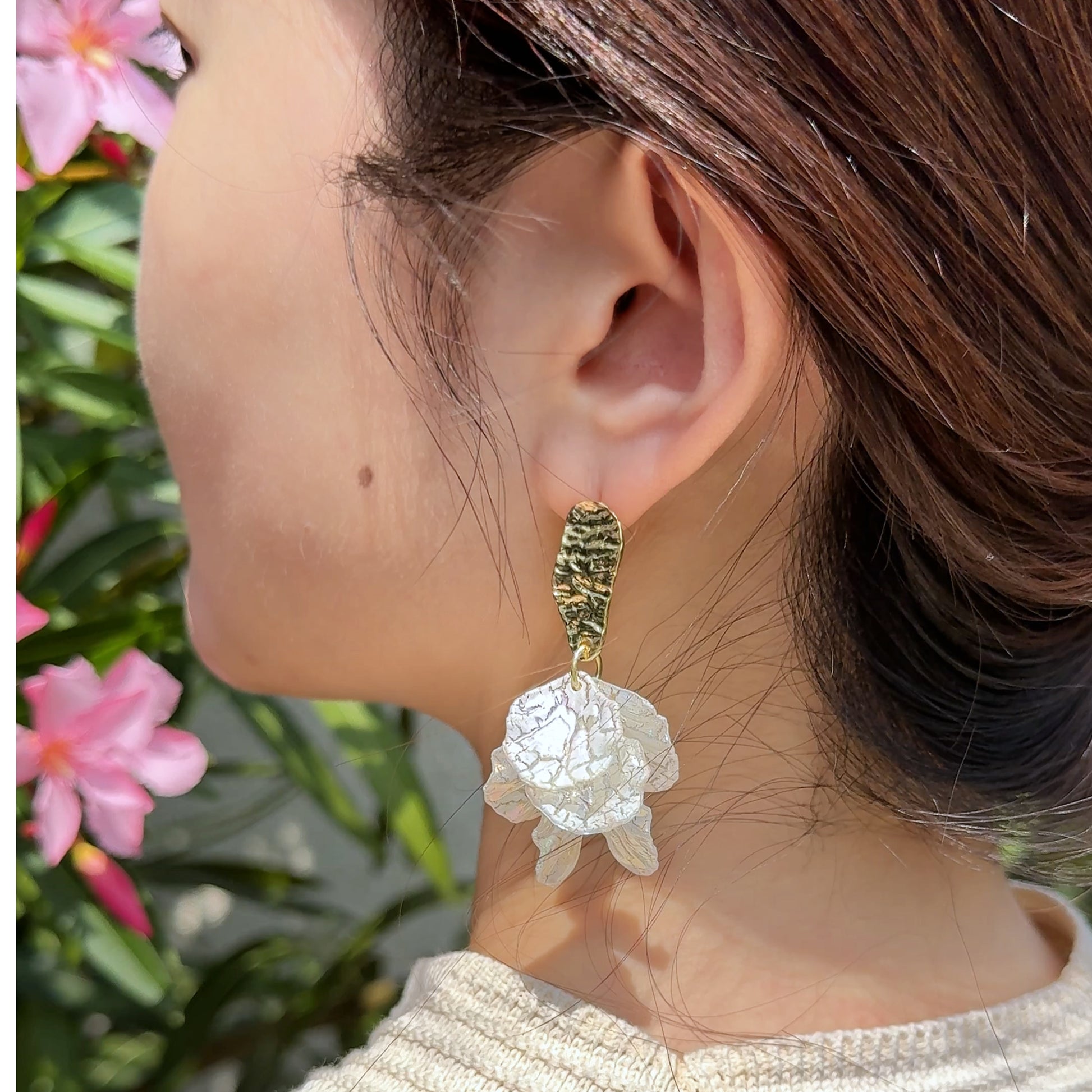 Romantic earrings with floral elements in French style